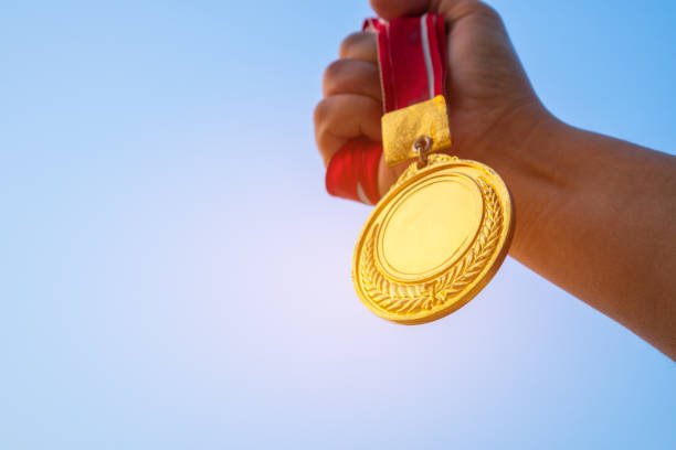 médaille récompensant un travail acharné